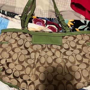 Green and tan coach purse